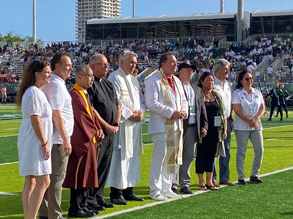 Maui vigil at football stadium